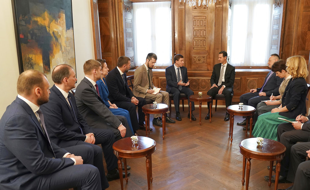 Syria's allies say airstrikes undercut political resolution