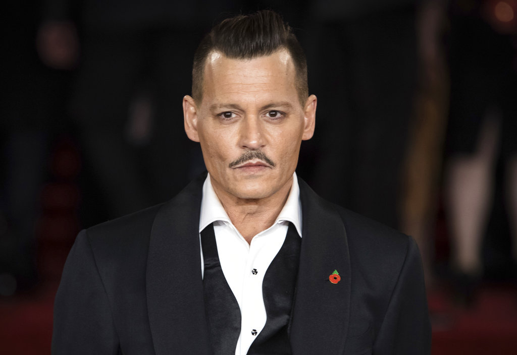 Crew member says Johnny Depp punched him on LA film set