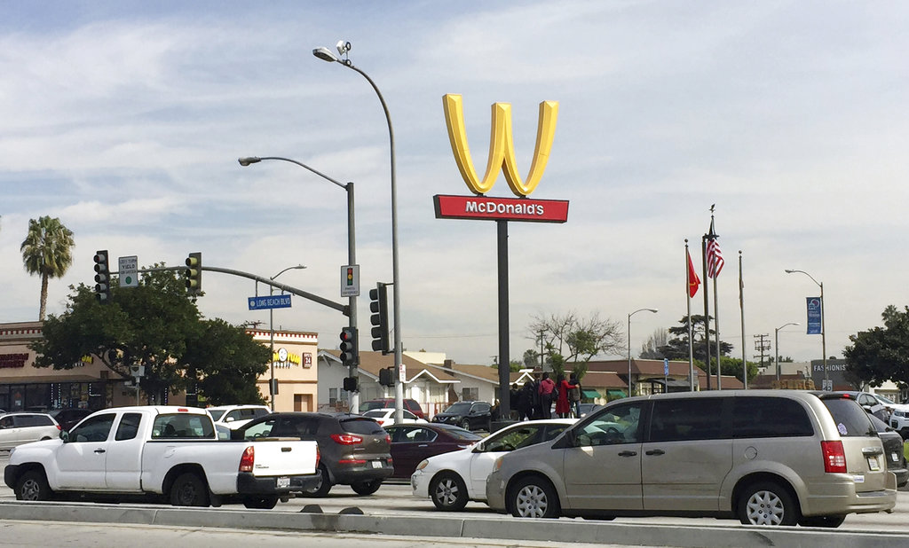 McDonald's flips Golden Arches to a 'W' for Women's Day