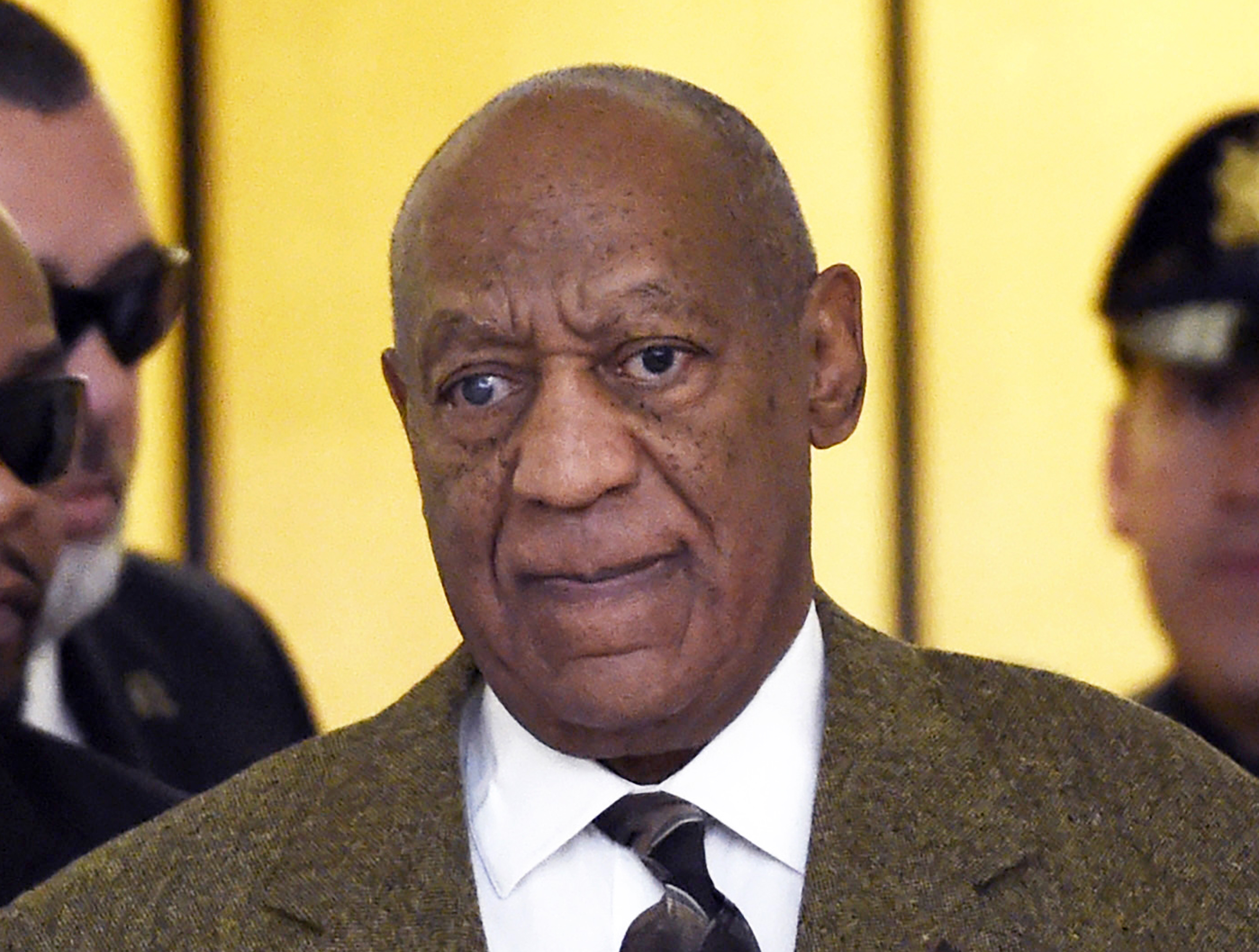 Woman sues Cosby, Hefner, claiming abuse at Playboy Mansion