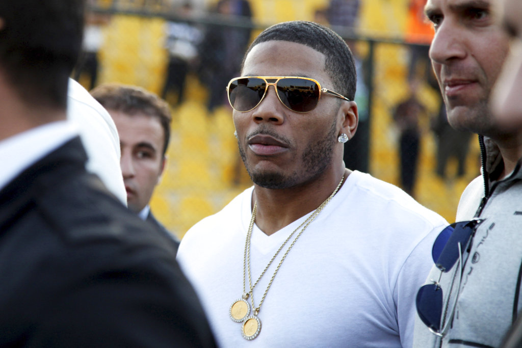 Rapper Nelly, fan file competing versions of sex encounter