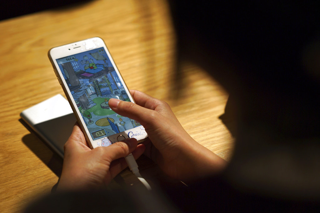 Holidaying frog game finds fans among China's harried youth