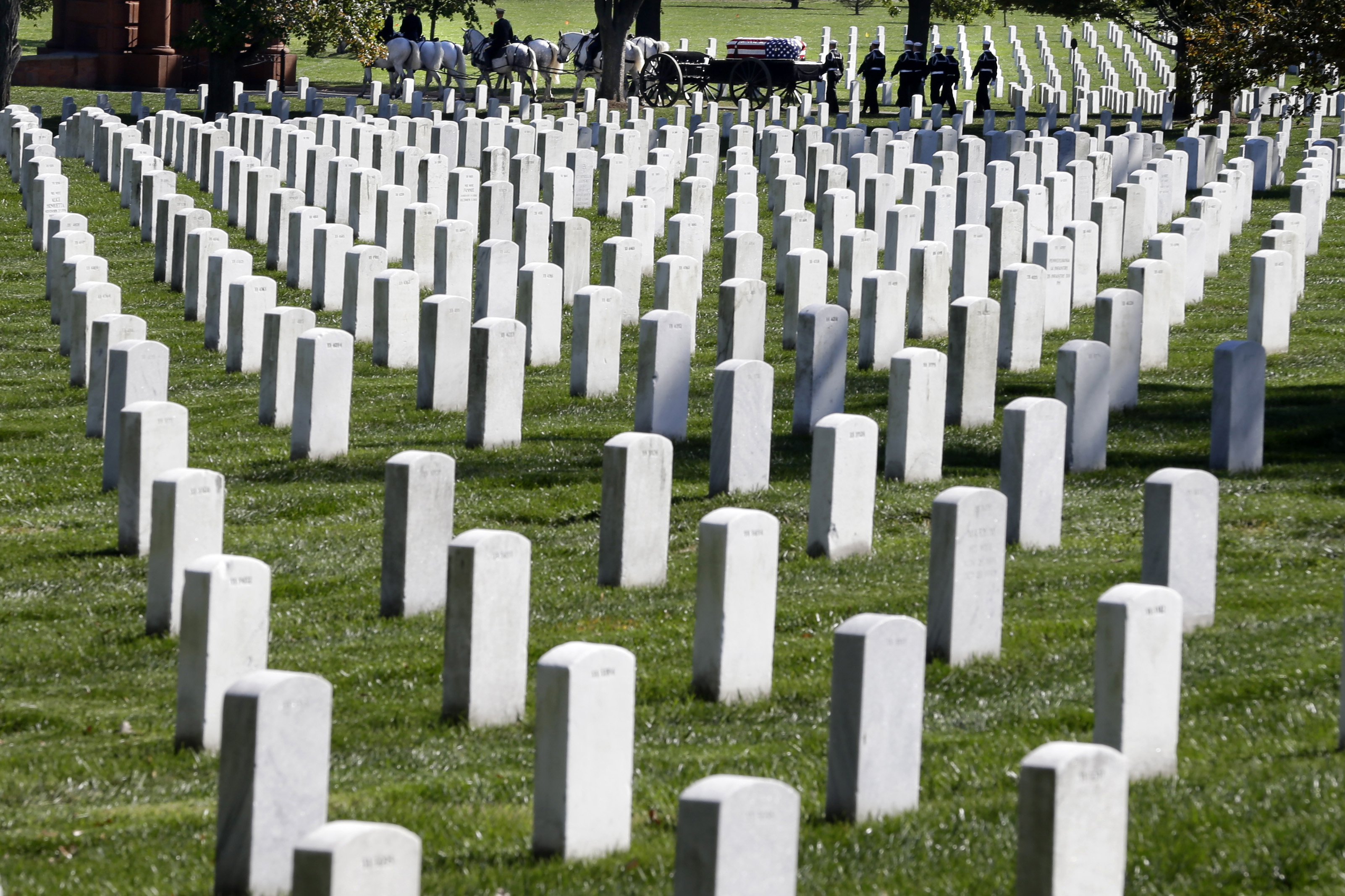 Obama signs bill to allow female pilots' ashes at Arlington