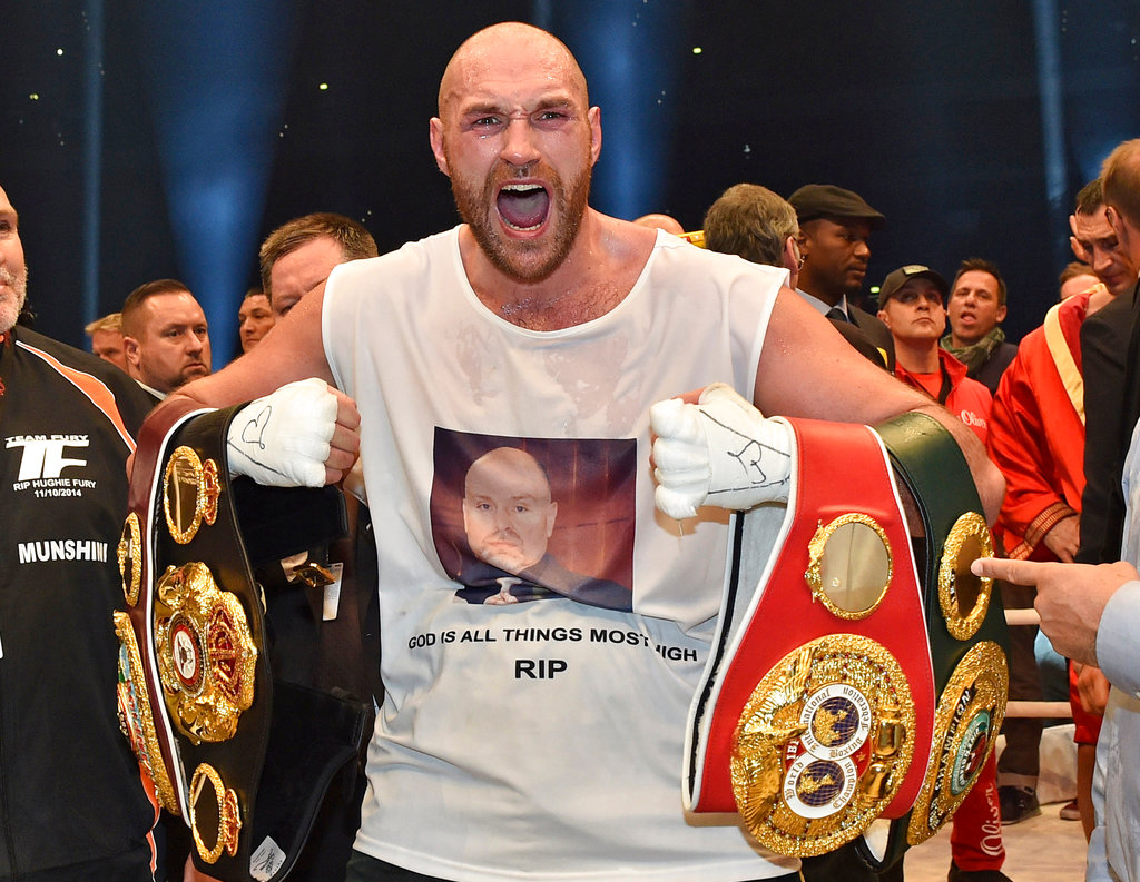Fury back in boxing to 'inspire others,' win belts back