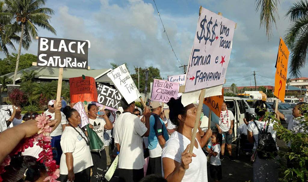 Protest march calls on Govt. to repeal land law
