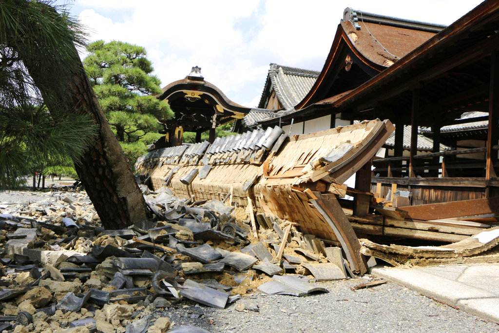 Typhoon leaves major airport closed and destruction in Japan
