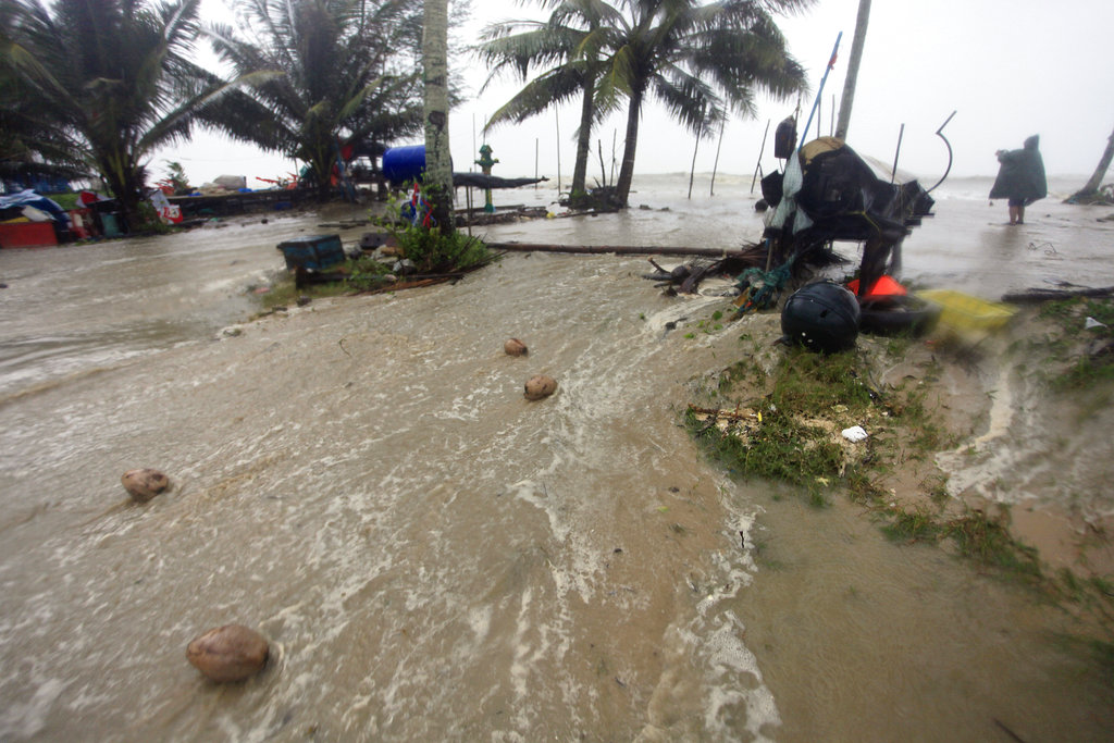Tropical storm's rain, surging seas strike Thai beaches